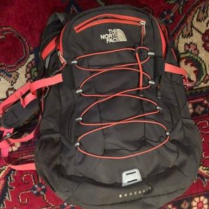 North Face pink and grey backpack